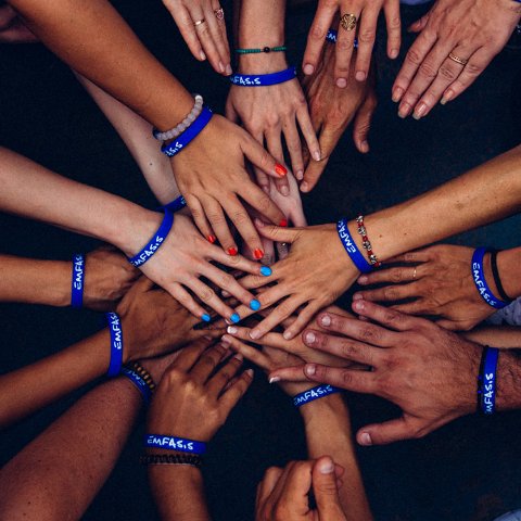 Hands joined together in a circle
